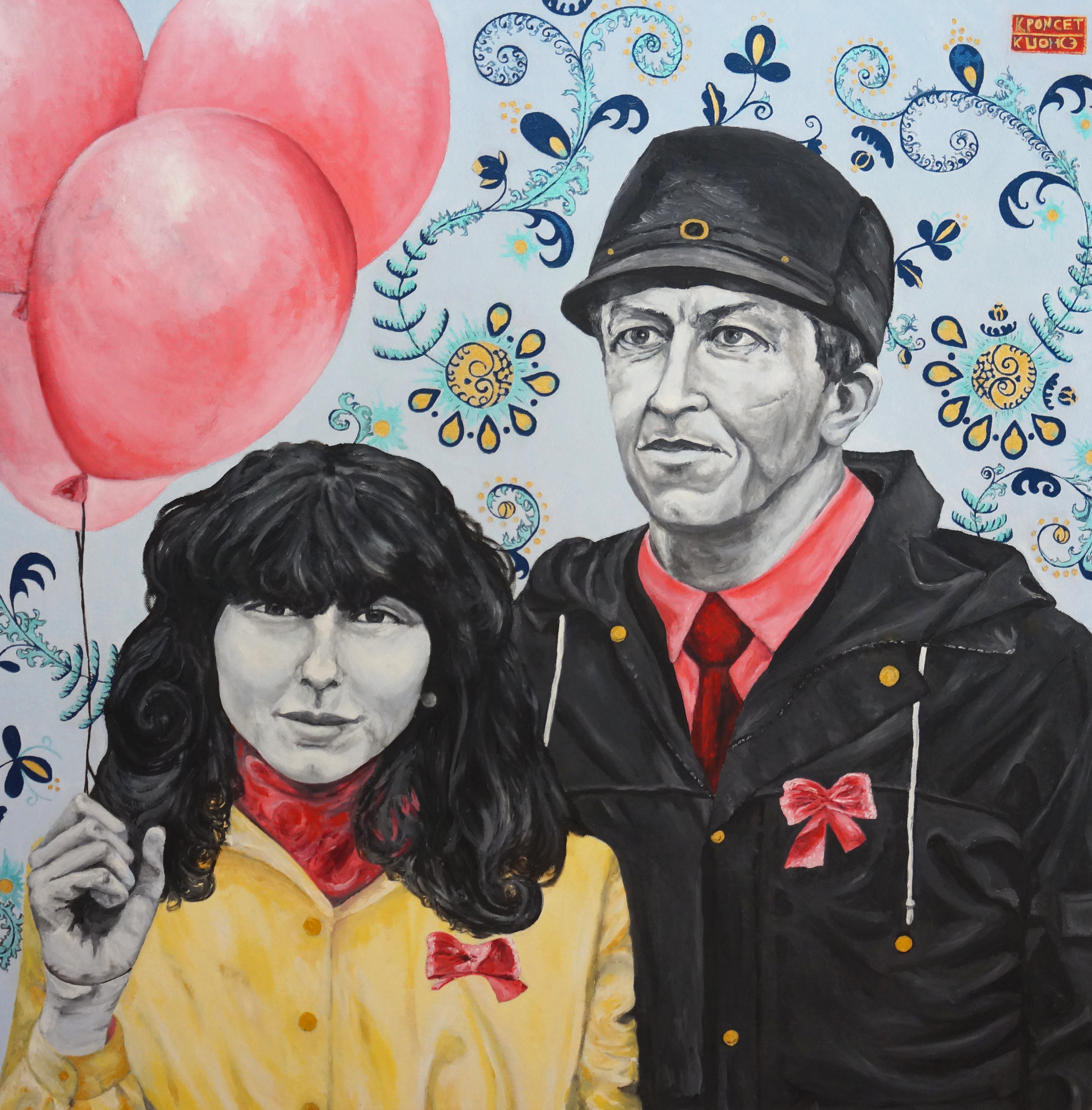 A gril holding a balloon with her father